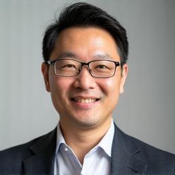 Professional headshot of Marcus Chen